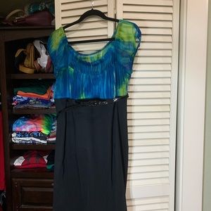 Dress with patent belt.